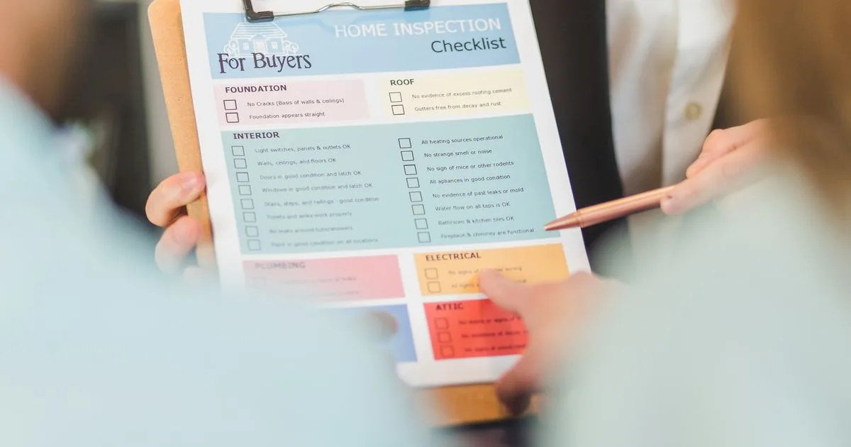 A checklist on a clipboard representing a client reporting review process